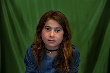 Yazidi Daliya Faroq (10) was held by ISIS for three years along with her sister Dalal. They have been living in Shariya camp for just two or three months.  This photograph is from a collaboration betw...