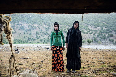 Zara and her sister-in-law, two Bakhtiari nomad women. Zara complains about pains in her shoulder and kidney stones, whoich she puts down to the hard nomadic life. She says she is looking forward to w...
