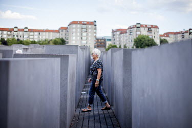 Visitors at the 'The Memorial to the Murdered Jews of Europe', the Berlin Holocaust Memorial.