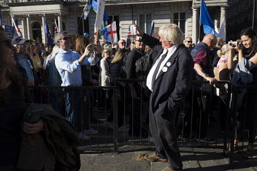 A man dressed as Boris Johnson waves to protestors during a rally demanding a further, so-called 'people's vote', referendum to decide Great Britain's position vis-a-vis the EU.