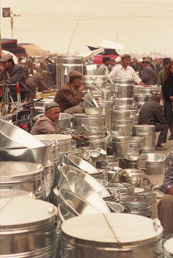Uyghur traders selling metal implements at the Friday Market.