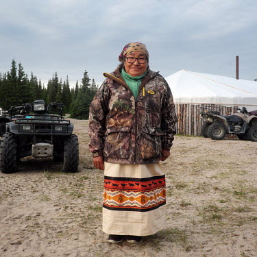 Agnes (67), a woman of Cree First Nation of Whapmagoostui, during the Cree Gathering at 9 km, where she and other elders teach youth about their roots and traditions.