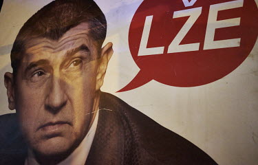 A banner with a photo of Andrej Babis with a speech bubble conatining one word: 'LÅ�E' (Lies) at a rally where thousands demanded the resignation of the Czech Prime Minister.