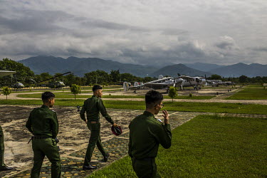 During a weekend excursion, young cadets from a military services academy walking past military planes displayed inside the compound of the Defence Services Museum.