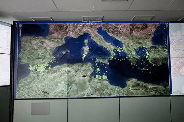 A screen displaying a map of the Mediterranean Sea and the surrounding countries in the operations room at the Frontex agency's headquarters. Here they receive data about possible breaches of the EU b...