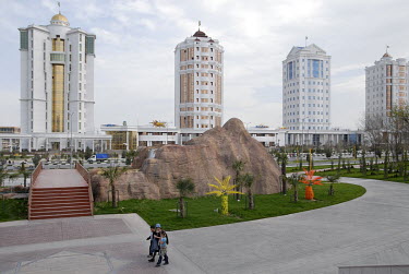 New apartment blocks near the World of Turkmen Fairy Tales, the local Disneyland. This area has been redesigned according to the esthetical and architectural instructions of former president Saparmura...