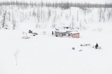The remote camp of a group of Evenk reindeer herders in the Siberian tundra.