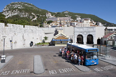 People board a bus at Grand Casemates Gates.