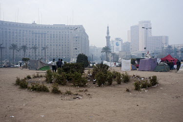 Tahrir Square, two days before the first anniversary of the Egyptian revolution. Tahrir, once a green square, is now a dusty place. Some protesters stay permanently on the Square, sleeping in tents. H...