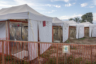 A row of so-called 'cubes', plastic Ebola treatment centres, run by The Alliance for International Medical Action (ALIMA) which can only be entered via a sealed door. Patients can be treated in isolat...