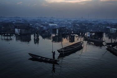 Mist hangs over alokoMakoko, an area of Lagos that has been affectionately called the 'Venice of Africa'. Other than the fact that people move around on boats and live in houses suspended over the wat...