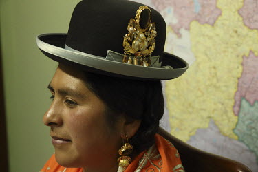 Carmen R. Gutierrez, the director of the transport company Rustas Sin Limite S.R.L. The successful businesswoman is an Aymara Indian and dresses in the traditional 'Cholita-style'.