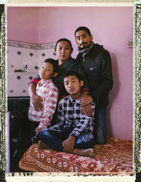 Ttransgender woman Sunita Thing (36) with her heterosexual husband Shankar Koirala (34) and their sons Sudip Thing (13) and Dipesh Thing (10). At 12 Sunita, from a poor rural family, was sent from her...