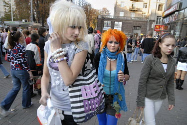 Young women with fashionably dyed hair on Khreshchatyk Boulevard.