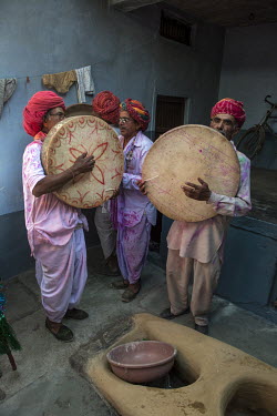 Musicians playing drums.