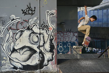 A skateboarder practices his jumps at a designated boarding area next to the Huashan 1914 Creative Park.