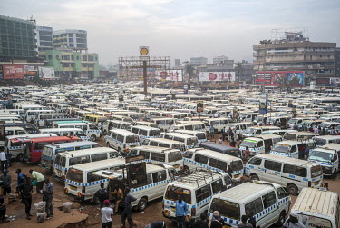 Buses and passengers at Buganda Bus Park.