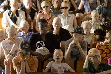 The audience at a meeting, organised by albino wrestler Texas Mwimba, to disscuss the medical and social problems faced by albinos.
