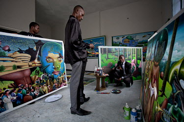 Artist Bodo and his sons who are all painters and share the same studio.