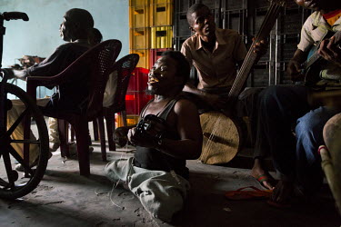 Members of Orchestra Handy Folk International reherse in the Ndjili (N'Djili) area of the capital. They were formed when a group of disabled people decided to create a group and try to make a living f...