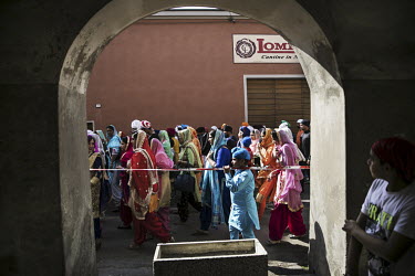 A crowd of around 12,000 Sikh migrants and their Italian born children, representing the Sikh community of the Po Valley and beyond, parade through the town's streets past the Gurdwara Singh Sabha Sik...