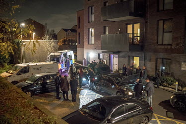 Members of a police Violent Crime Task Force search a car for drugs during an operation against gangs in north London.