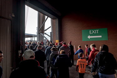 Fans leave the Anfield ground at the end of a Liverpool FC match.