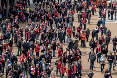 Liverpool FC fans gather outside the Anfield stadium on a match day.