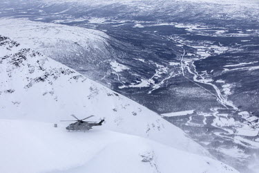 A British Merlin helicopter during exercise Clockwork in the Arctic.  845 Naval Air Squadron is a squadron of the Royal Navy's Fleet Air Arm. Part of the Commando Helicopter Force, it is a specialis...