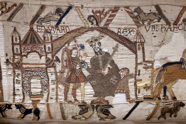 A section of The Bayeux Tapestry (La Tapisserie de la Reine Mathilde) on display at the Bayeux Museum.
