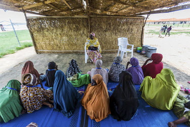 At a camp for internally displaced people (IDPs), a group of girls are undergoing one of the several bonding and life skills activities available as part of the rehabilitation and integration program...