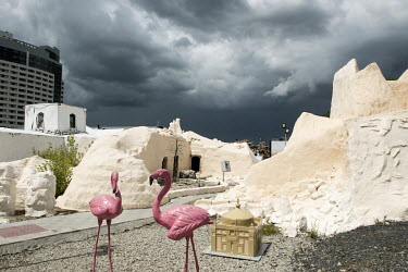Flamingos decorate a giant model three dimensional map of Kazakhstan at the Atameken Ethno-Memorial Complex.