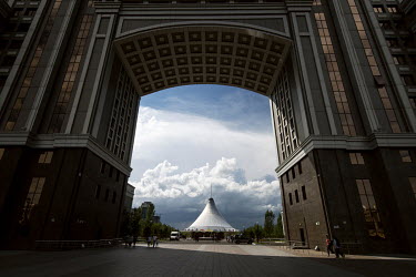 The Khan Shatyr Entertainment Centre seen view the arch in the centre of the KazMunayGas (KMG) headquarters building.