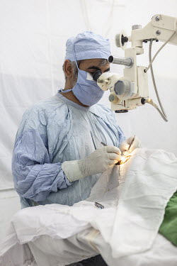 A Pakistani surgeon performs an eye surgery in Galkayo hospital.