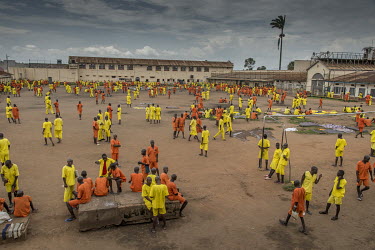 Prisoners in a courtyard at Luzira Prison where there is a football league played among inmate sides.