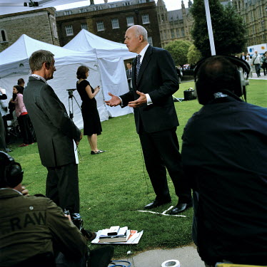Former Conservative Party leader Iain Duncan Smith talks to a journalist on College Green on the day Gordon Brown took over as British Prime Minister. Often referred to as College Green, Abingdon Stre...