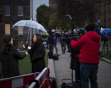 Political activist Gina Miller is interviewed for televison on College Green following a tense Parliamentary session on the Prime Minister's Brexit deal that took place in the nearby House of Commons....