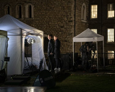 Television crews on College Green film reports after the British Prime Minister Theresa May survived a 'Vote of No Confidence' in the House of Commons during the ongoing Brexit talks that followed the...