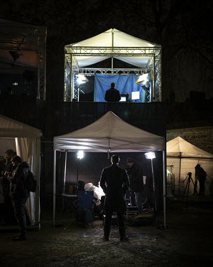 Television crews' tents are illuminated at night on College Green as journalists prepare to report on a tense Parliamentary session where MPs debated the Prime Minister's Brexit deal in the nearby Hou...