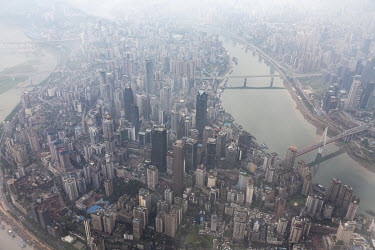 An aerial view of Chongqing and its two rivers ( Yangtze and Jialing) taken from a aeroplane.