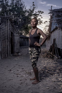 Narinja Marchelin (37) outside her home in Tampolove. Marchelin started farming sea-cucumbers as an alternative to fishing and hunting octopus in 2009. 'Life is good now', she said. 'The Zangas have b...
