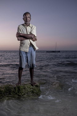 Julien Rajirivina (45) on Andavadoaka beach. Rajivirina is a line fisherman specialising in trevally and other large species. He approves of the no-catch-zones that have been implemented, and makes su...
