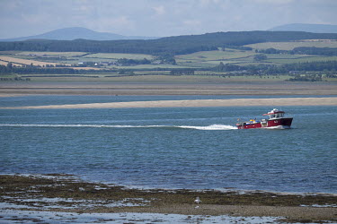 A fishing boat near shore.