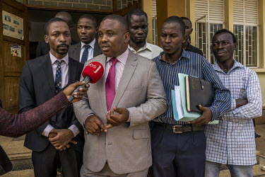 Outside the high court Erias Lukwago (Ssalongo), a lawyer, opposition politician and Mayor of Kampala, addresses the media following his visit to see activist Dr Stella Nyanzi in the court's jail. He...