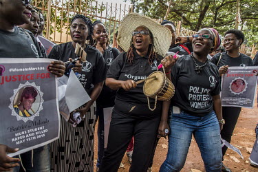Following the reported murder of 20 young women in areas around Katabi, Entebbe, and Nansana (Wakiso district) and a number of cases of women being kidnapped, activist Stella Nyanzi (playing drum) joi...
