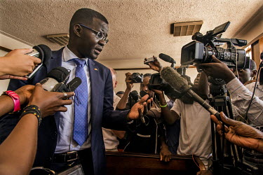 Nicholas Opiyo, one of the lawyers representing activist Dr Stella Nyanzi, talks to the press on the day (10 May 2017) Dr Nyanzi was released on bail, after more than a month in prison.