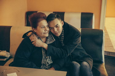 Mama Natasha (left, 60), with Murat, (not his real name, 24), in the underground gay club, Mayak. Mama Natasha is the club owner and openly supports the LGBT community. She says: ''The government want...