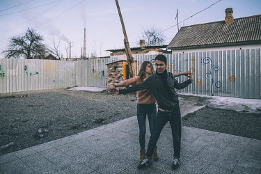 Mirza (22) (not his real name, right) and Diana, who are both active in the Kyrgyz LGBT community, dancing in the backyard of Labrys' (a local NGO that promote LGBT rights) compound.