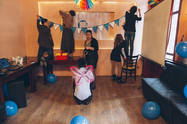 Members of LGBT community decorating a hall in preparation for a party, organised by Labrys, a local NGO, that is committed to LGBT rights in Kyrgyzstan.