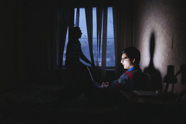 John, (not his real name, 23), works on his laptop at a secretly located shelter for the members of the LGBT community. John, a universty student from Turkmenistan, identifies as bisexual. He says: ''...